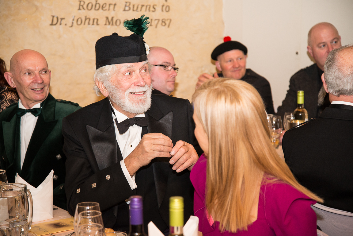 A man enjoying the night at Burns Cottage